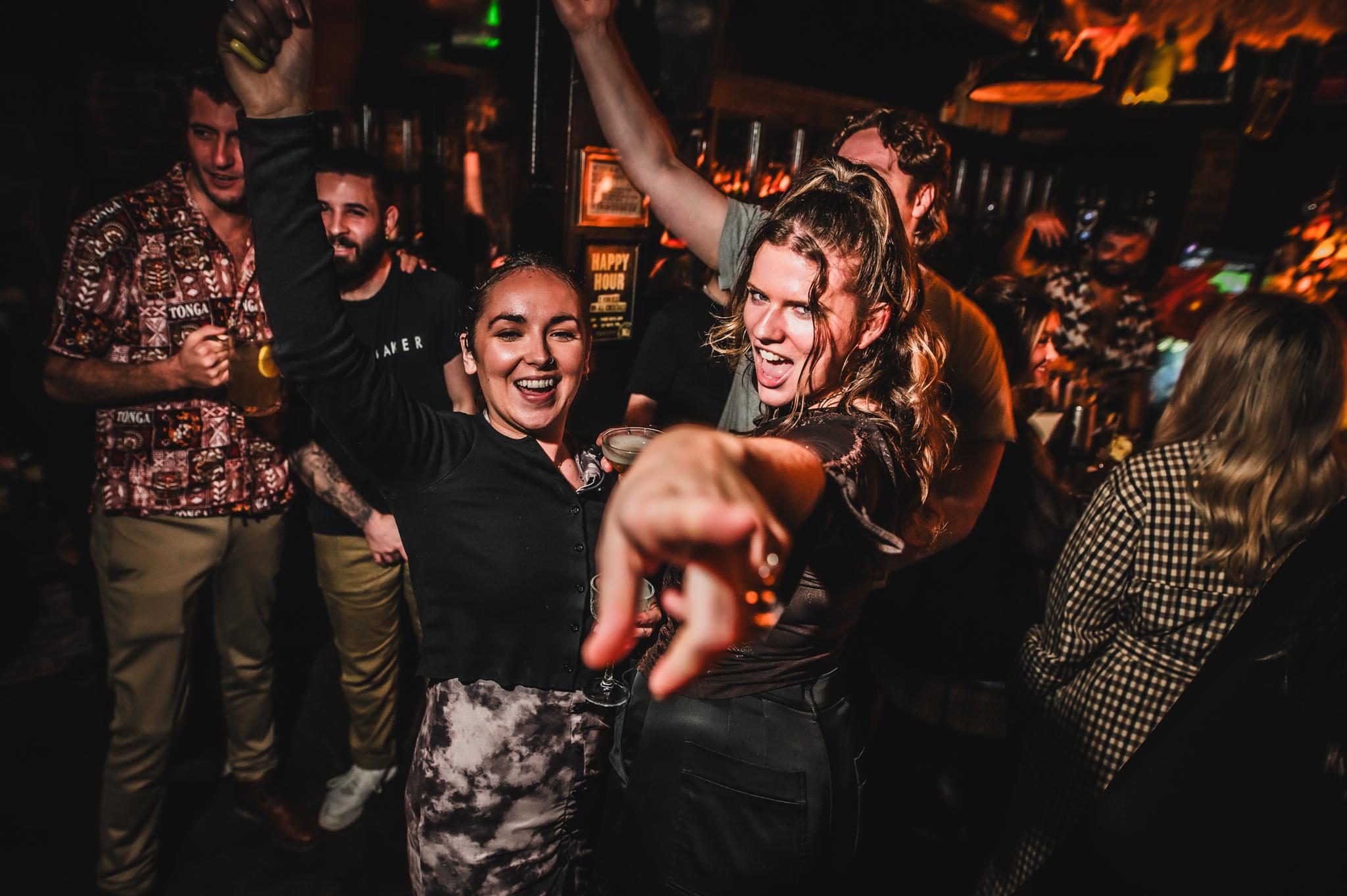 Women dancing in The Cocktail Club bar