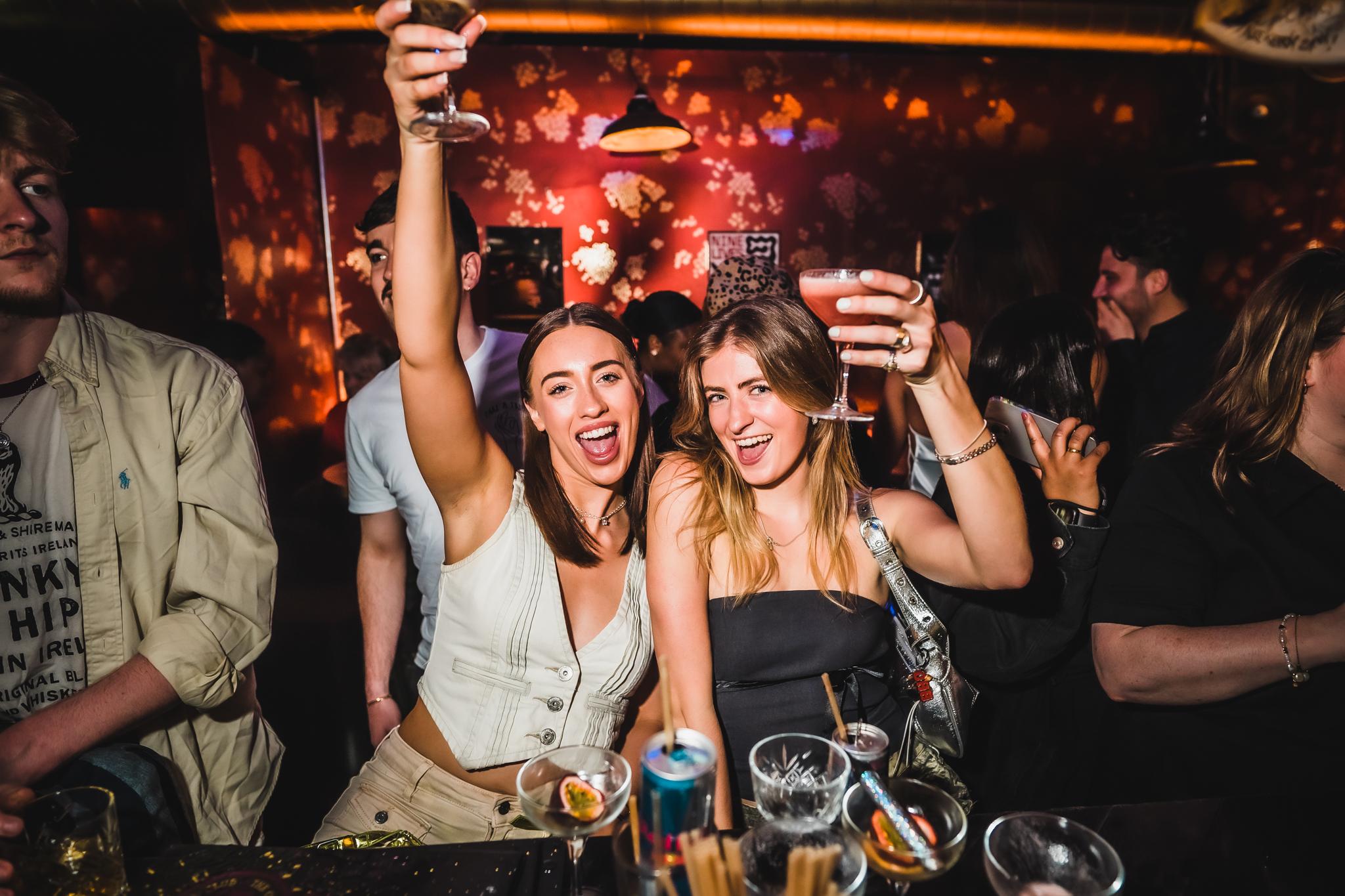 Women enjoying cocktails at The Cocktail Club